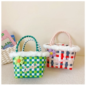 Detail of woven kids handbags with plush faux fur trim and colorful checkered patterns