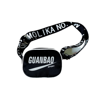 Kids black sport crossbody bag with white zippers and Molika No.1 lettered strap