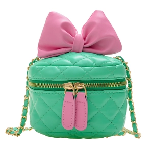 Mint green quilted mini chain bag for girls with large pink bow and gold metal strap