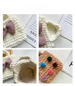 Detail of handmade knit plush bag with checkered bow and colorful pom-poms accents