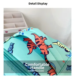 Detail shot of the comfortable top handle and smooth zipper on cartoon dinosaur backpack