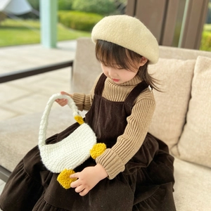 Handmade knitted white goose handbag for girls with yellow accents and a matching beret