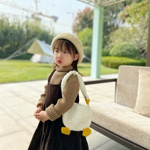 Handmade crochet white goose handbag for girls with a charming animal shape and knit texture