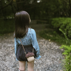 Handmade crochet acorn crossbody bag for girls with natural forest texture and strap