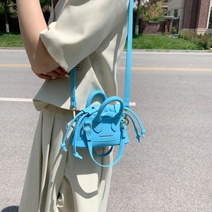Mini shell-shaped crossbody bag in bright blue textured leather for children
