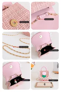 Detail of pink tweed girl's handbag with floral accents and mobile phone size comparison