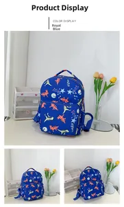 Close-up of royal blue toddler backpack with colorful dinosaur prints and front pocket