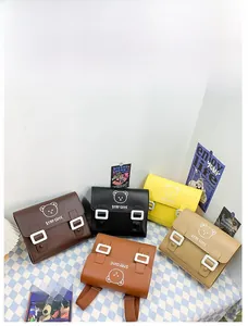 Detailed flat lay of children's square PU backpacks with cartoon bear and Stay Cute text
