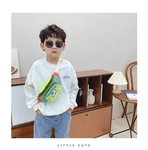 Close-up of kids color-block waist bag with PLAY letter print and adjustable strap