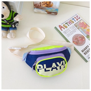 Detail view of colorful kids fanny pack with PLAY! print and adjustable nylon strap