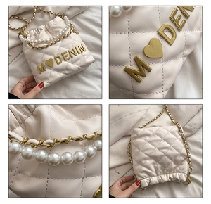 Detailed views of beige quilted bucket bag with pearl handle and gold chain strap