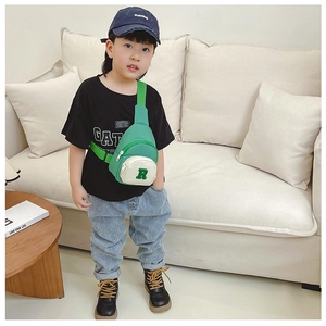 Close-up of green letter R embroidery on color-block nylon kids crossbody bag