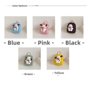 Detail display of cartoon plush canvas mini backpacks in blue, pink, black, green and yellow