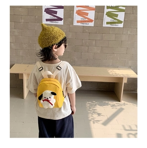 Toddler yellow canvas backpack featuring a cute 3D plush dog with red ribbon and straps