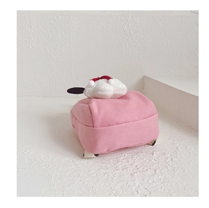 Detail view of pink canvas toddler backpack with cute white 3D cartoon plush puppy dog