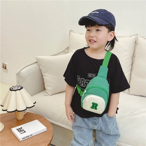 Kids nylon crossbody chest bag with green 'R' patch and contrast color design for boys