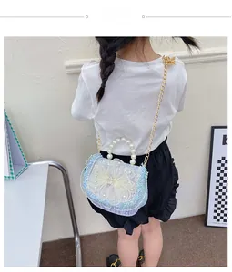 Girl's light blue princess bag with lace bow, pearl handle and crown detail