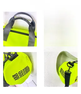Vue détaillée du sac de voyage cylindrique jaune néon pour enfants avec double zip