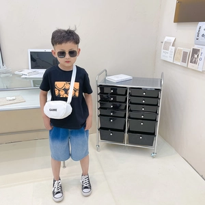 Kids streetwear set with black smiley t-shirt, denim shorts and white GAME crossbody bag