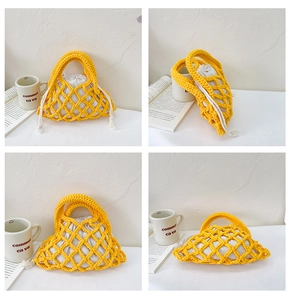 Detail view of yellow handmade crochet net bucket bag with a white canvas drawstring liner
