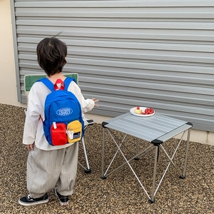 Colorful kids school backpack with red and yellow pockets for outdoor travel activities