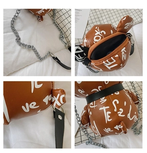 Detailed views of bear crossbody bag showing graffiti texture and silver chain strap