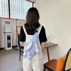 Sac bandoulière lapin bleu clair mignon avec queue en peluche et sangle ajustable