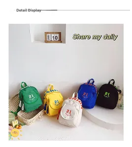 Flat lay display of lightweight canvas backpacks for kids in five vibrant assorted colors