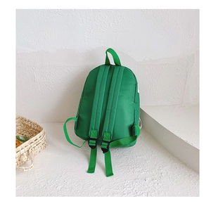 Rear view of lightweight bright green canvas kids backpack with adjustable shoulder straps