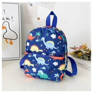 Close-up of cute cartoon dinosaur print on a dark blue canvas toddler backpack