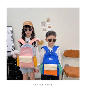 Close-up of kids' color-block backpacks with large capacity and durable canvas material