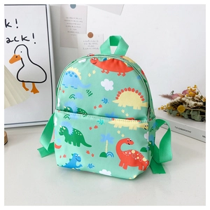 Detail of light green mini toddler backpack with colorful cartoon dinosaur patterns