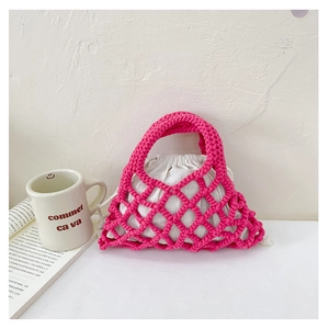Detail of rose pink hand-woven mesh bag with white canvas drawstring inner pouch