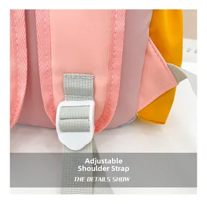 Detail of adjustable shoulder strap and plastic buckle on colorful kids canvas backpack