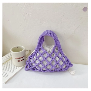 Detail of purple hand-woven fishnet bucket bag with white cotton drawstring lining