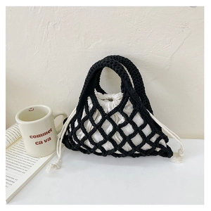 Detail of children's woven mesh bag featuring black fishnet and white drawstring liner