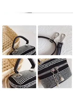 Détails du mini sac en strass noir avec ferrures argentées et fermeture éclair en perles
