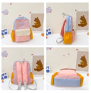 Detail view of colorful patchwork kids backpack showing side pockets and adjustable straps