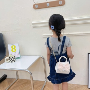 White mini princess handbag for girls with pink lace bow and pearl handle with chain strap