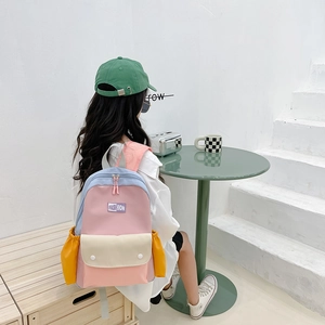 Kids color-block canvas backpack with fashion label and matching cap for school travel