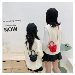 Matching mini bow handbags in black and red PU leather for mother and daughter