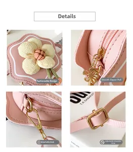 Detail view of pink PU flower bag with zipper, metal hook and adjustable strap