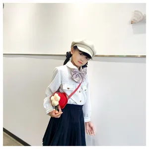 Girl's mini red flower PU crossbody bag paired with kids academic style outfit