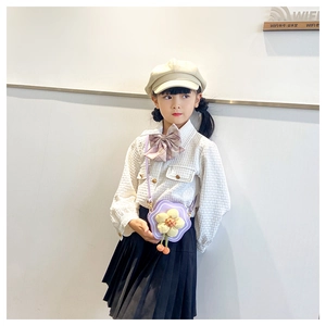 Girl's school style outfit featuring white textured shirt and purple flower crossbody bag