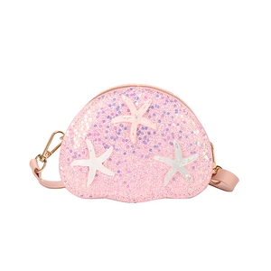 Pink sequined crossbody bag for girls with iridescent starfish accents and shoulder strap