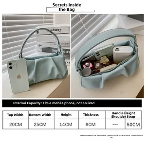 Size guide for light blue pleated cloud bag showing dimensions and phone storage capacity