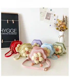 Flat lay of colorful floral PU leather crossbody bags for girls in six vibrant shades