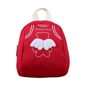 Cute kids red canvas backpack with plush wings and Good Luck bear print for toddlers