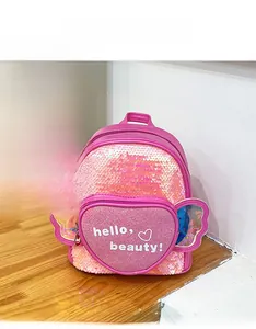 Detail of pink sequin heart backpack with butterfly wings and hello beauty text