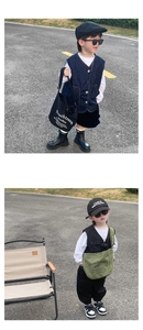 Detail of trendy canvas crossbody bags for boys in black and army green colors